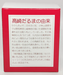 Takasaki Daruma red paper mache surface conveys genuine texture