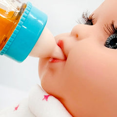 Taken All Magic Bottle Set in action shows a sipping-feeding moment.