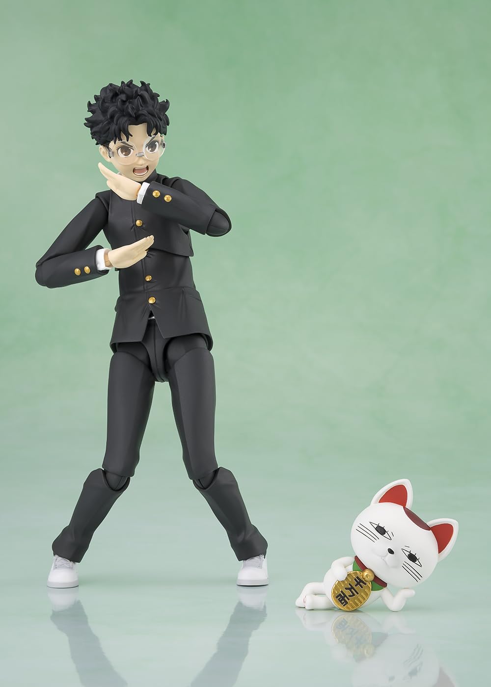 Turbo Baba beckoning cat accessory included with Okarun
