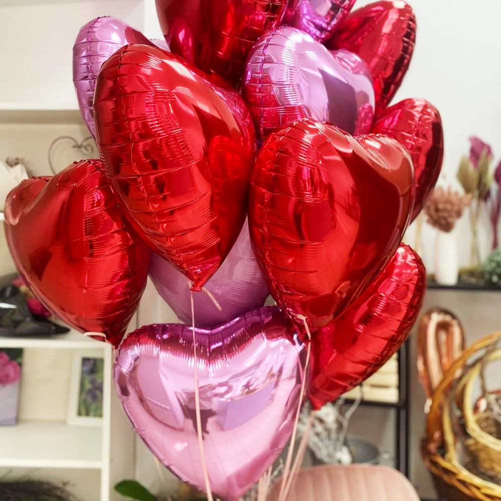 TAOYE light pink foil heart balloon complements baby showers with soft romance
