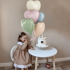 TAOYE pastel heart foil balloon in light green adds fresh color for parties and walls