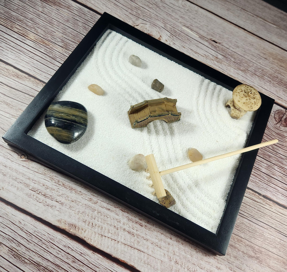 Tapbull Zen Sand Garden bamboo rake enables a relaxing desk routine.