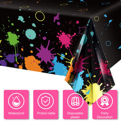 Tatuo Black-light tablecloth close-up showing vibrant colors under UV light for party ambiance.
