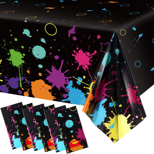Tatuo glow party tablecloth with neon circles for vibrant party decor.