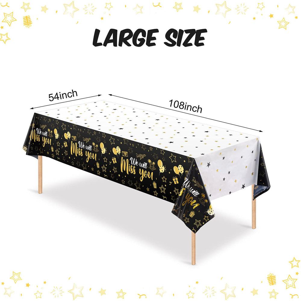 Close-up of the gold star print on the Tatuo tablecloth for party vibe.