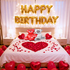 Tayuvira Happy Birthday banner letters decorate romantic birthday setup.