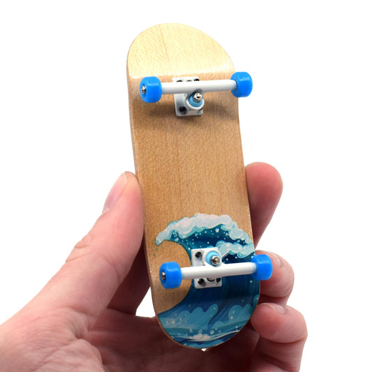 Teak Tuning Waves deck with white wave graphic for durable, stylish practice sessions.