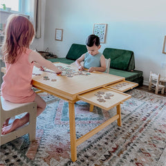 TEAKMAMA puzzle table with four drawers keeps pieces organized during play