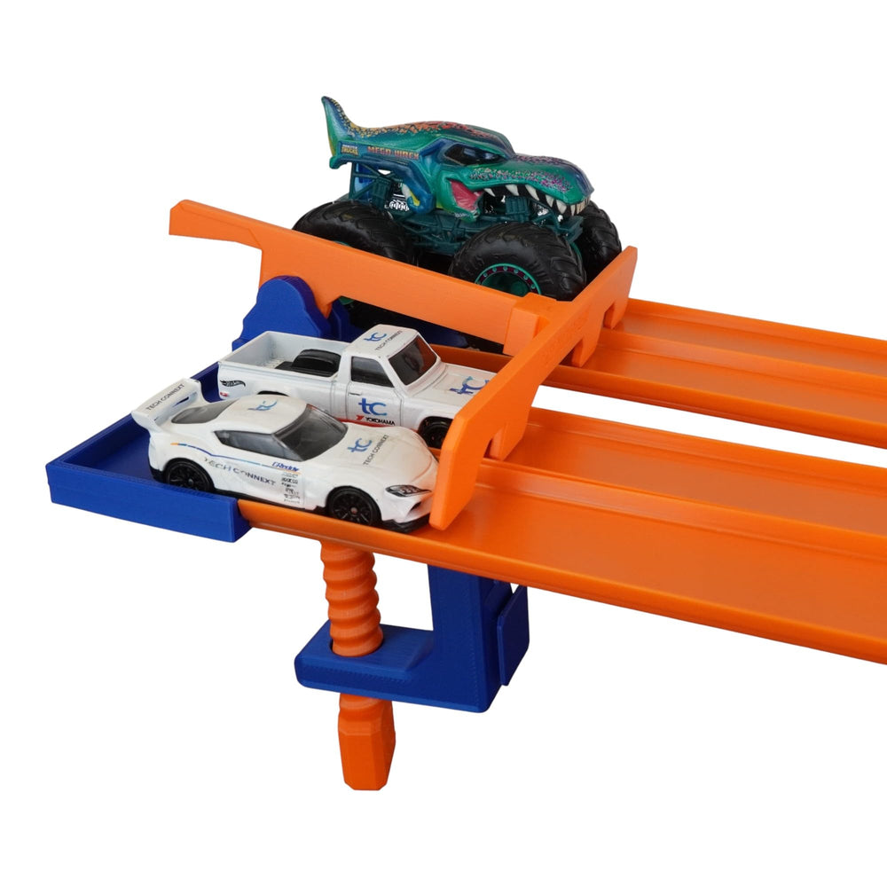 TechConnext Monster Truck Track Clamp front view showing the four-lane start gate
