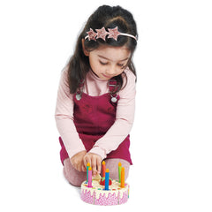 Tender Leaf Toys Rainbow Cake slices connected by hook-and-loop for easy serving.
