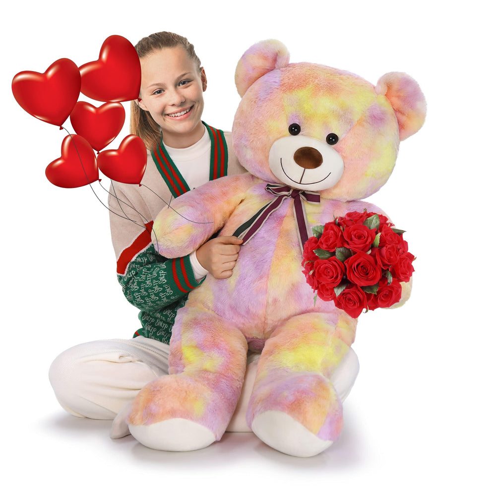 Tezituor 40in giant teddy bear for cuddling in a bedroom.