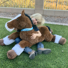 Tezituor horse plush placed on a sofa as a versatile comfort prop.