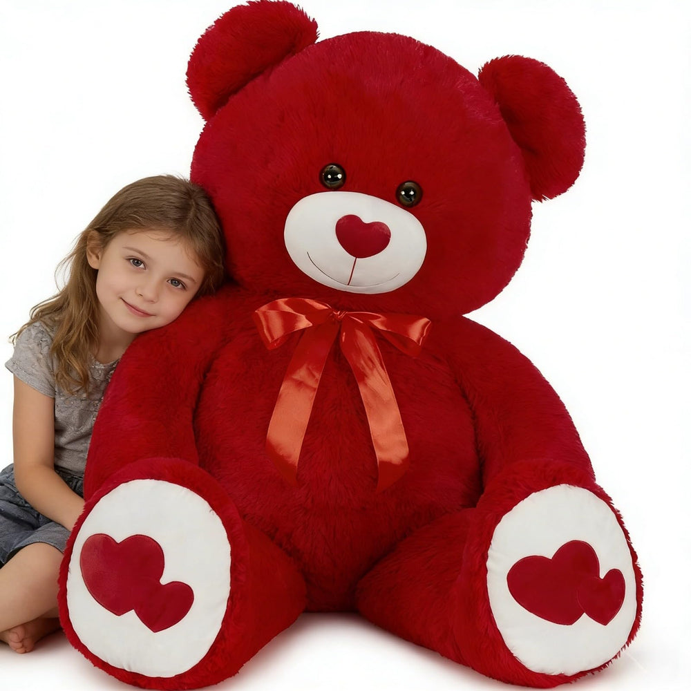Tezituor 47-inch large teddy bear with red heart for dramatic gifting and cuddling.