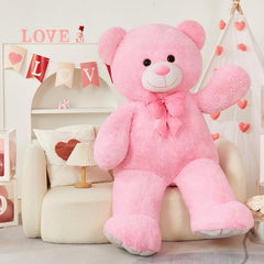 Tezituor pink plush teddy with a bow tie for charming room accents.