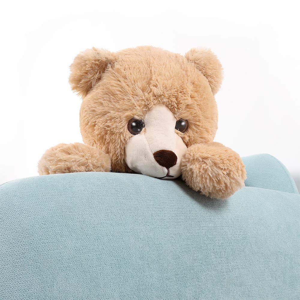 Tezituor teddy bear in cozy room setting as decor.