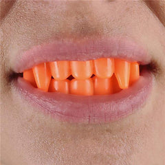 The Dreidel Company Neon Fangs Teeth closeup showing bright glow