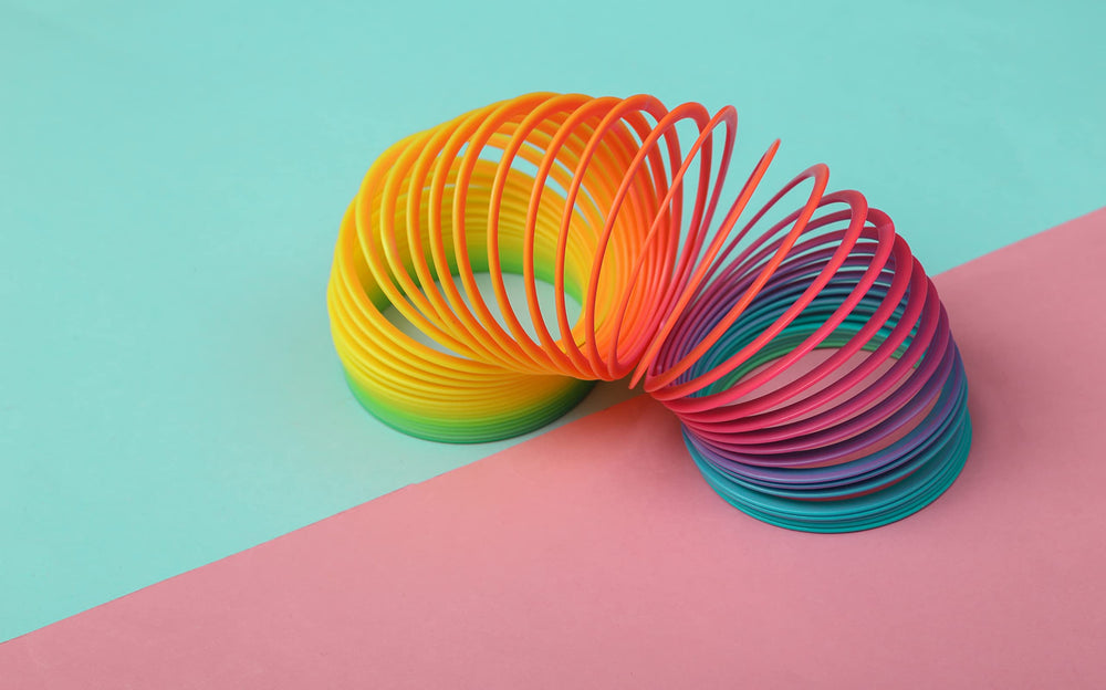 The Dreidel Company 3-inch springs add lively atmosphere to parties and creative activities.