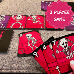 The Dusty Tophat Couch Skeletons hand cards showcase quick setup and strategy.