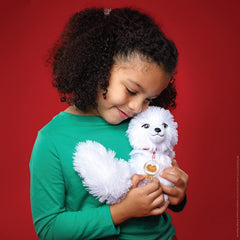 The Elf on the Shelf Elf Pets Traditions plush duo invites cuddly play.