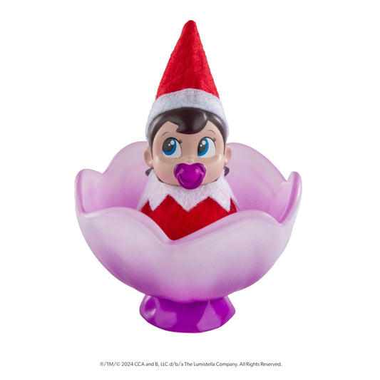 The Elf on the Shelf Frost Pips mini elf baby girl with blue eyes ready for cozy play.