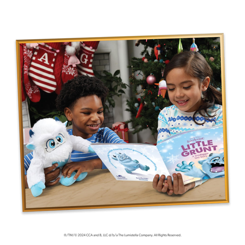 The Elf on the Shelf Little Grunt storybook beside plush for cozy reading