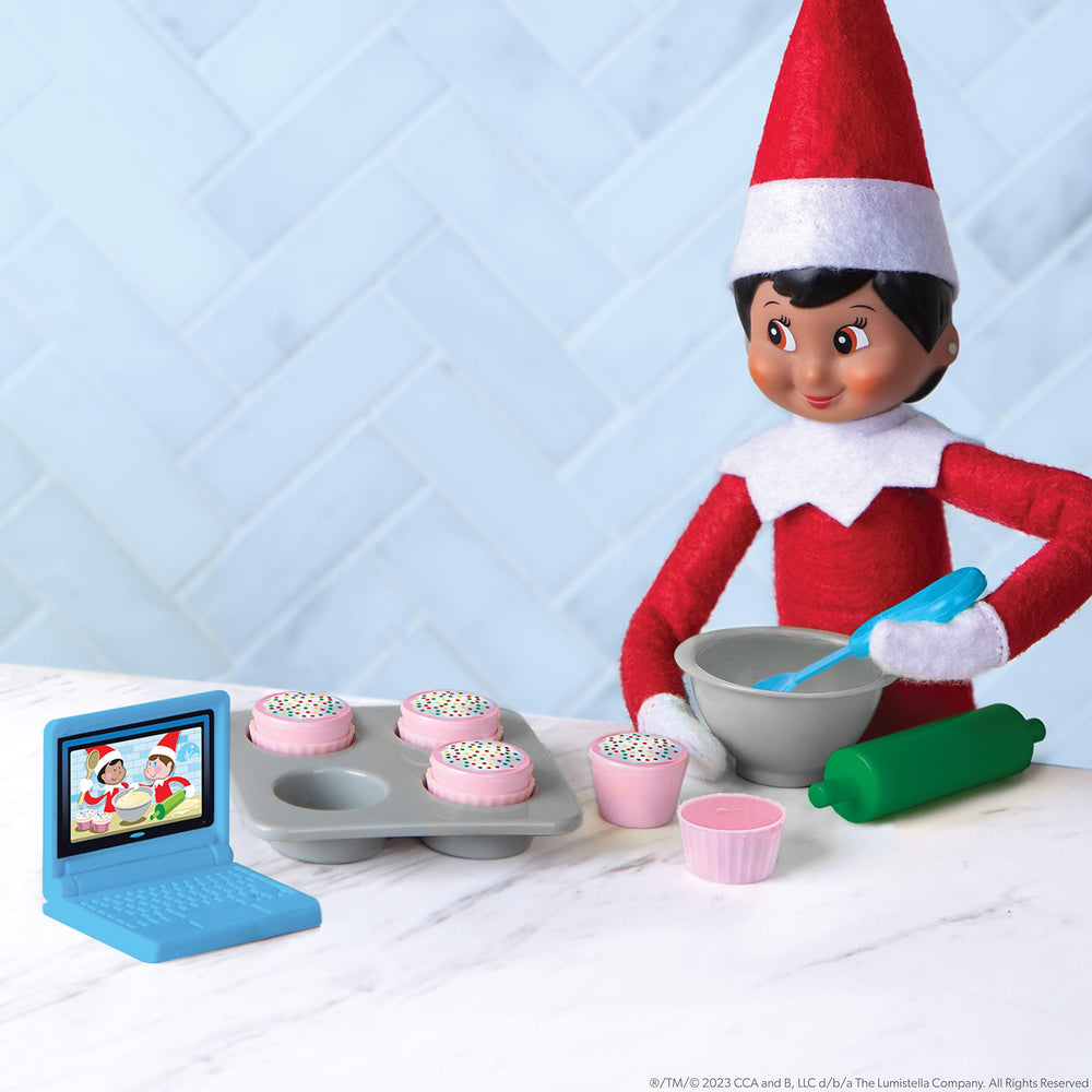 The Elf on the Shelf Polar Props rolling pin helps craft cozy baking scene narratives.