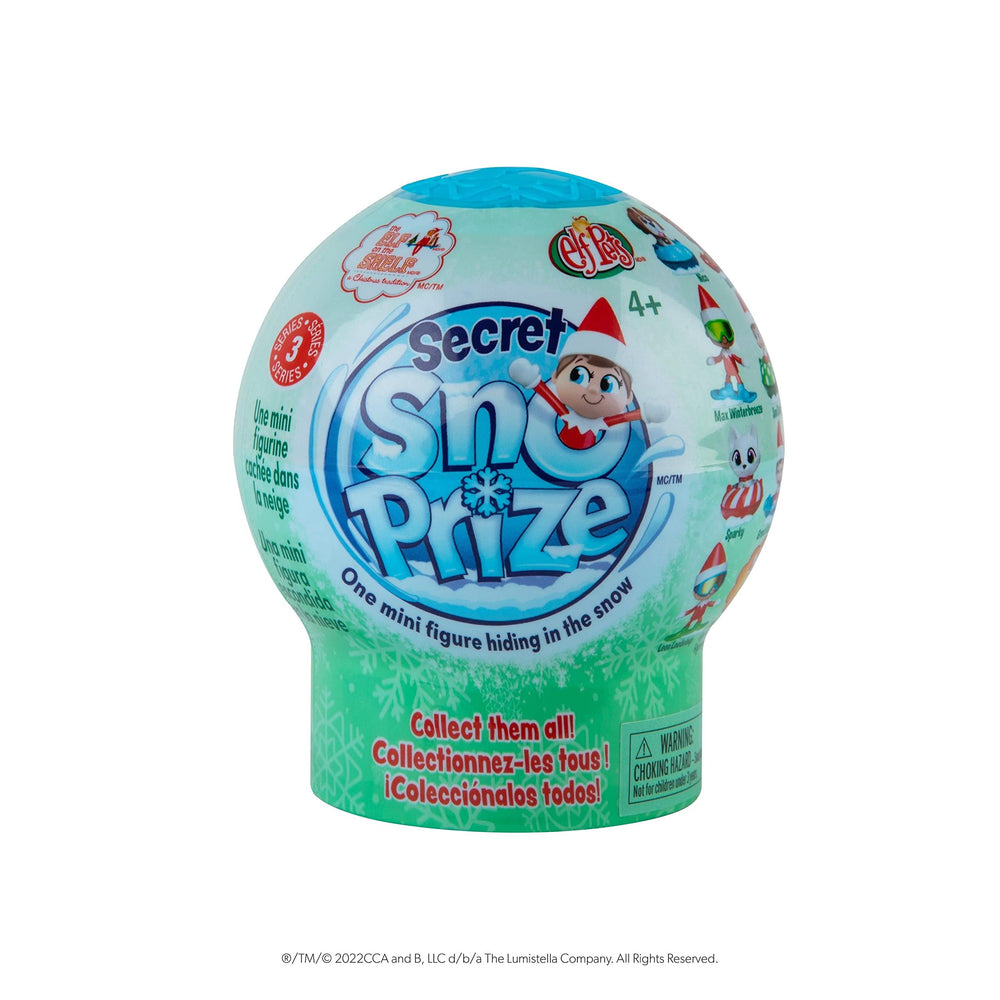 The Elf on the Shelf Secret SnoPrize unboxing moment with the globe and snow