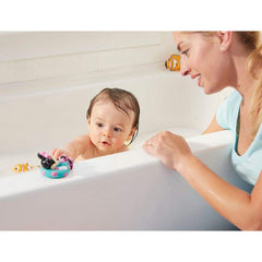 Minnie Mouse squirties beach ball motif sparks splashy bath or tub play.