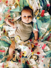 The Learning Lovey firefighter teether-link clip offers easy stroller or car seat access.
