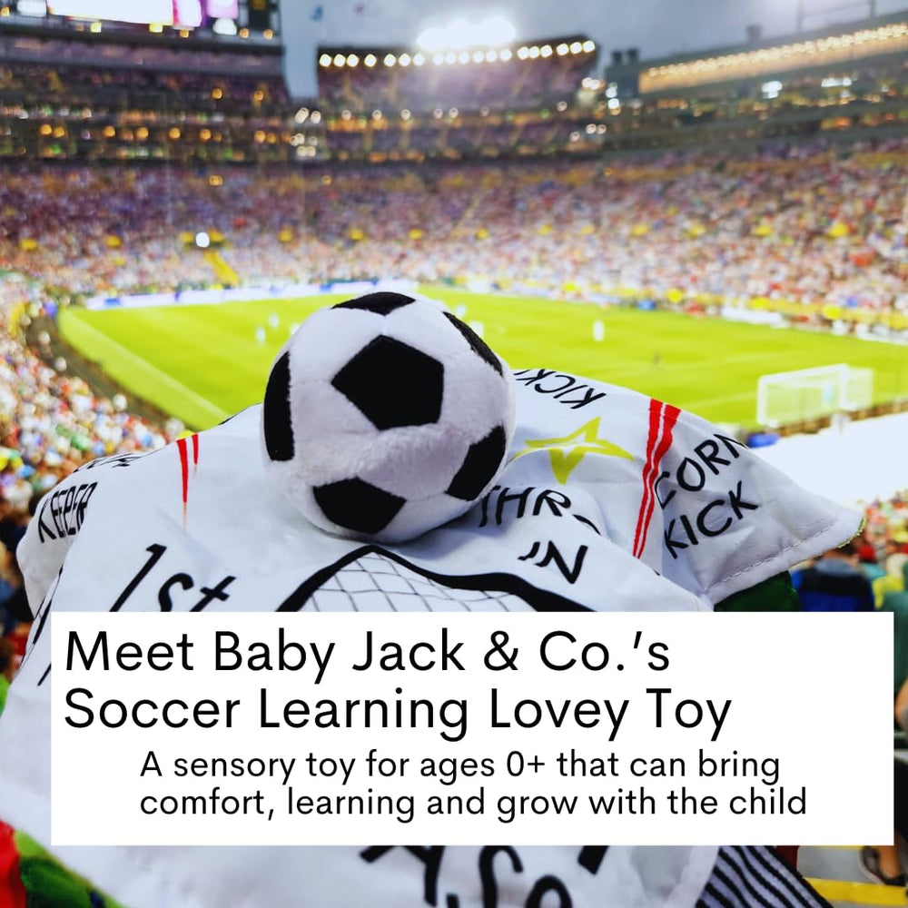 Close-up of sensory tag toy with stroller clip attachment