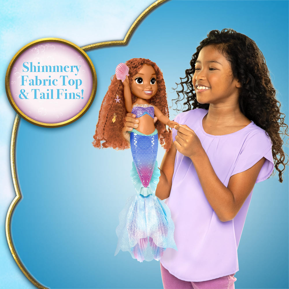 Ariel doll comes with dinglehopper and seashell for treasure-themed play.