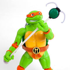 The Loyal Subjects Michelangelo with interchangeable head portrait for versatile display.