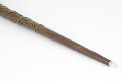 The Noble Collection Hermione Wand packaging and tray display setup