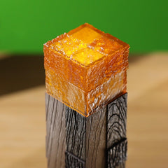 The Noble Collection Minecraft Torch Illuminating Collector on desk creates a cozy, Minecraft-inspired workspace.
