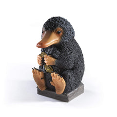 The Noble Collection Niffler No.1 figure side view highlights intricate painting and fur texture.