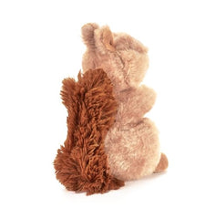 The Petting Zoo brown squirrel eyes—bright, inviting for bedtime stories and friendly companionship.