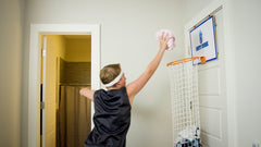 The Dunk Collection Dirty Dunk handles laundry with a playful basketball vibe.