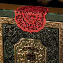theory11 Derren Brown playing cards gold and green wrap evokes antique book allure.