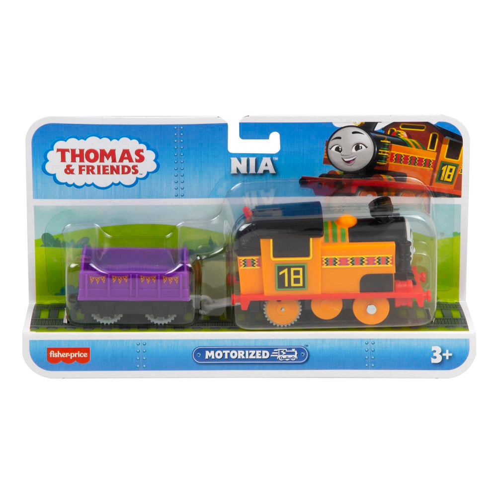 Nia engine on track with cargo car during pretend play.