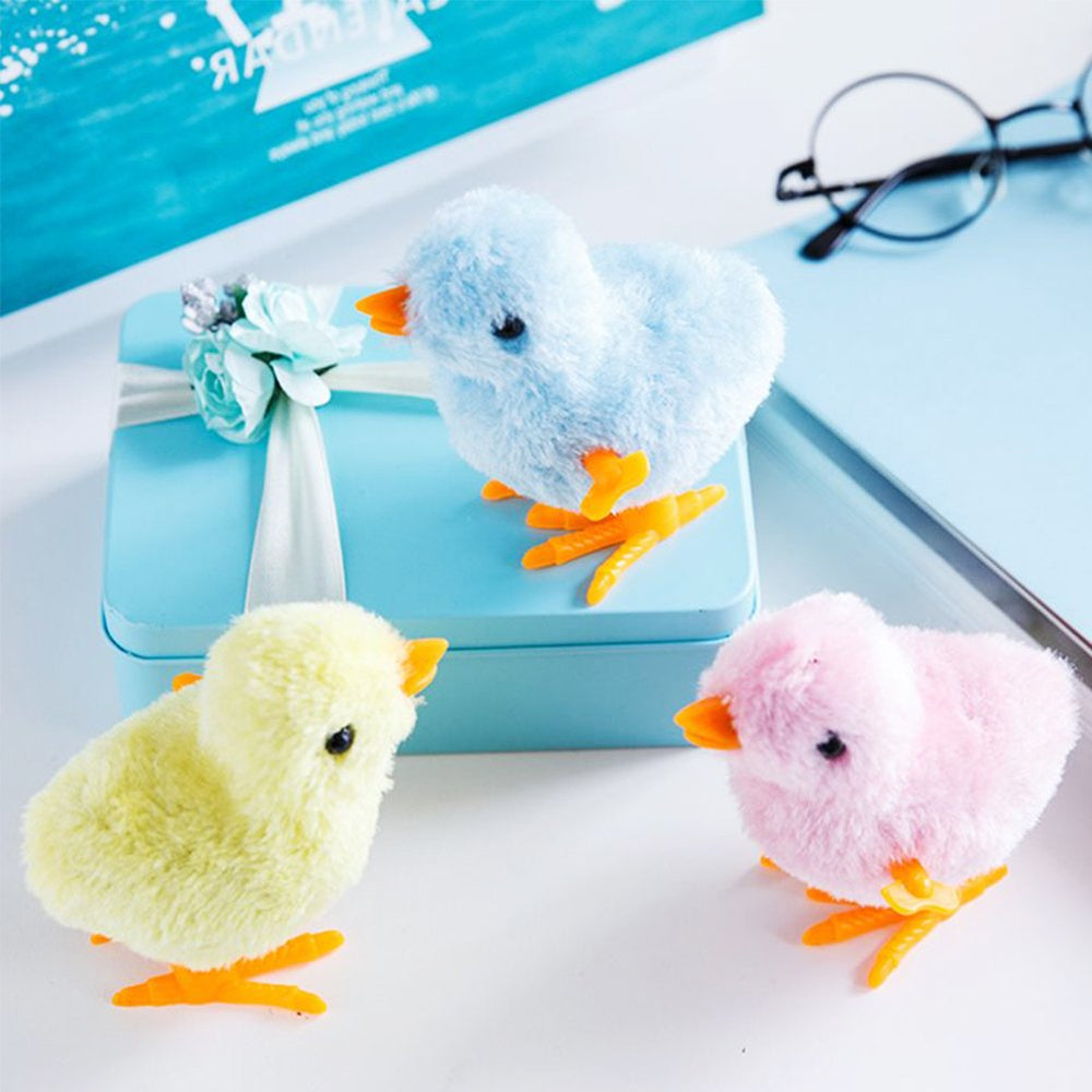 3 Otters wind-up chick toy ideal for party favors and playtime.