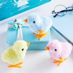 3 Otters wind-up chick toy ideal for party favors and playtime.