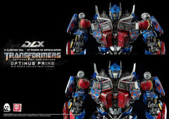 threezero Transformers Optimus Prime DLX LED eyes glow in dramatic lighting