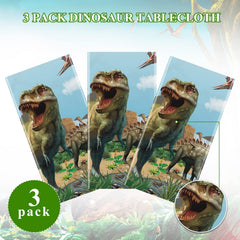 Tiamon dinosaur tablecloth spread on blue table scene showcases vibrant party setup