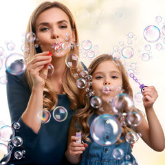 Time4Relax outdoor bubble play with superhero wands in sunny weather.