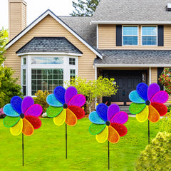 Timecity garden wind spinner showcases reflective surfaces in sunlight.