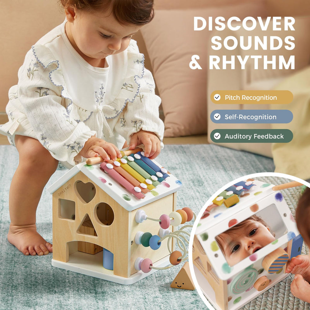 Tiny Land doors and windows open for tactile exploration and storytelling.
