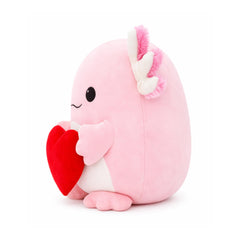 Tiralia axolotl plush on bed adds playful decor and gentle companionship.