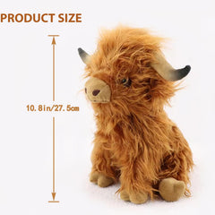 Toaje Highland Cow plush used as a decorative pillow on a couch.