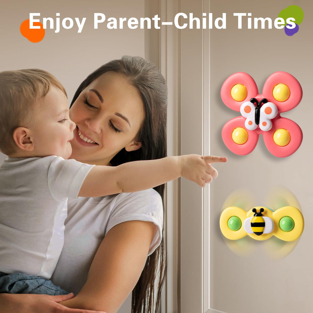 TOHIBEE spinner toy held by toddler hands encourages hand-eye coordination.