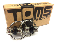 Tom's Fidgets chain fidget in black, portable pocket-size anxiety companion